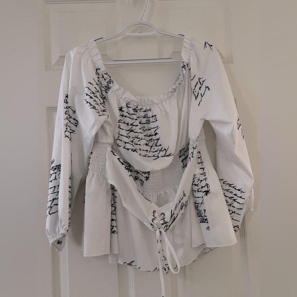 SHEIN Curve Slogan Graphic Off Shoulder Frill Trim Grommet Lace Peplum Blouse